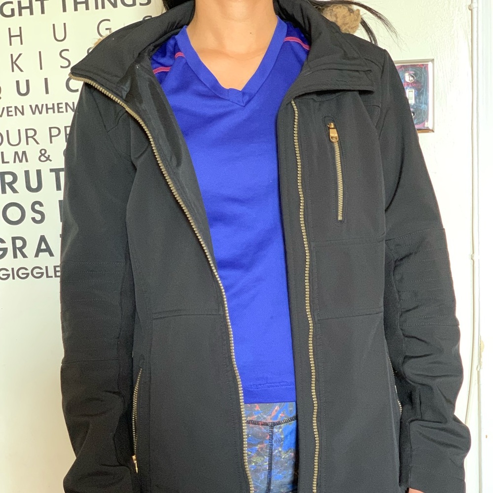 Black trench coat jacket by Andrew Marc